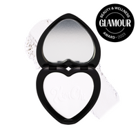 Heart-shaped Kim Chi translucent powder compact, featuring a sleek design and awarded by Glamour 2023.