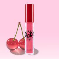 Kim Chi Chic liquid lipstick in vibrant pink with a sleek red cap, 0.16 fl oz (4.8 mL), paired with cherries.