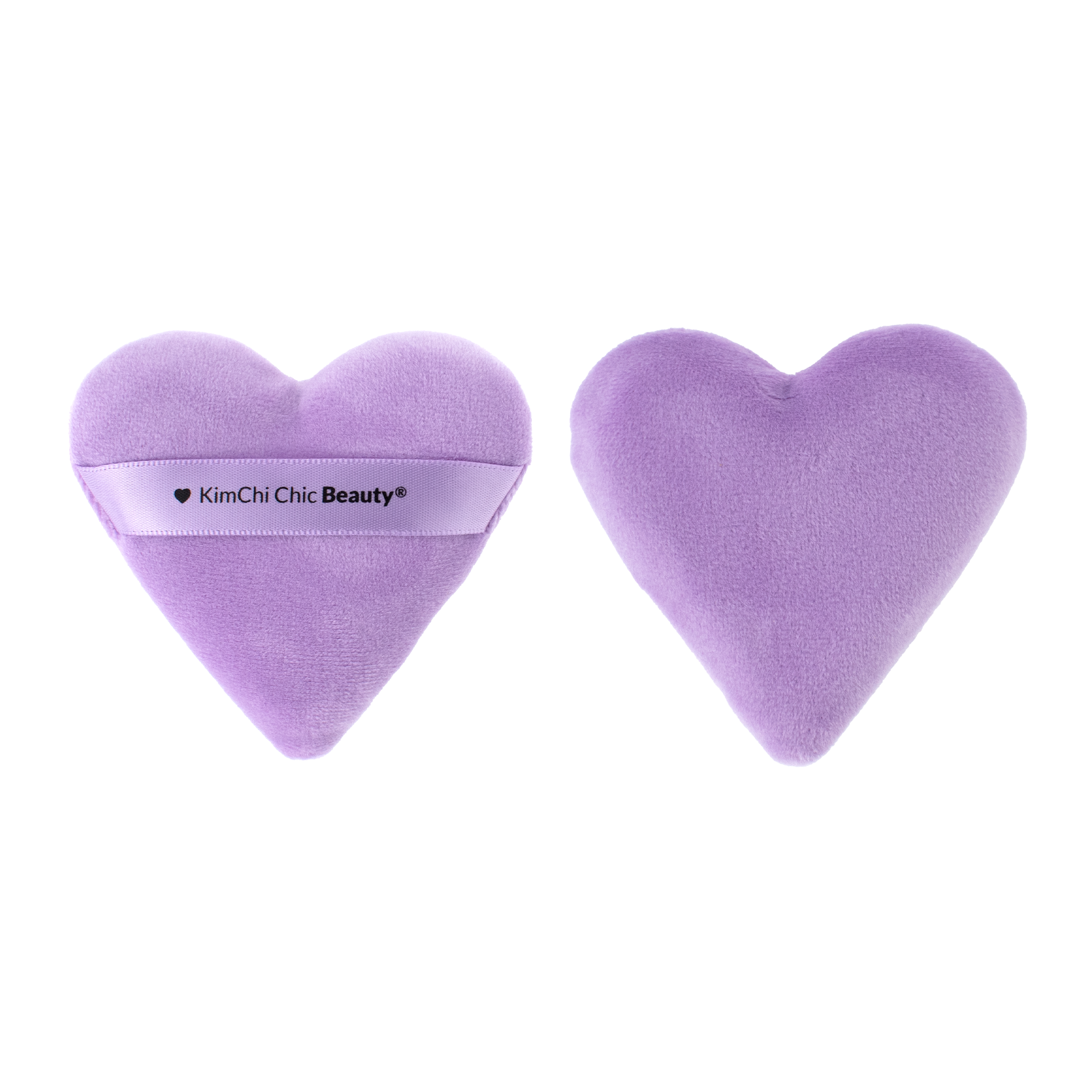 Heart-shaped makeup sponge in soft lavender color, featuring KimChi Chic Beauty branding.