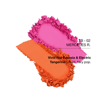 Two vibrant pigments: vivid hot fuchsia and electric tangerine, ideal for bold makeup looks.