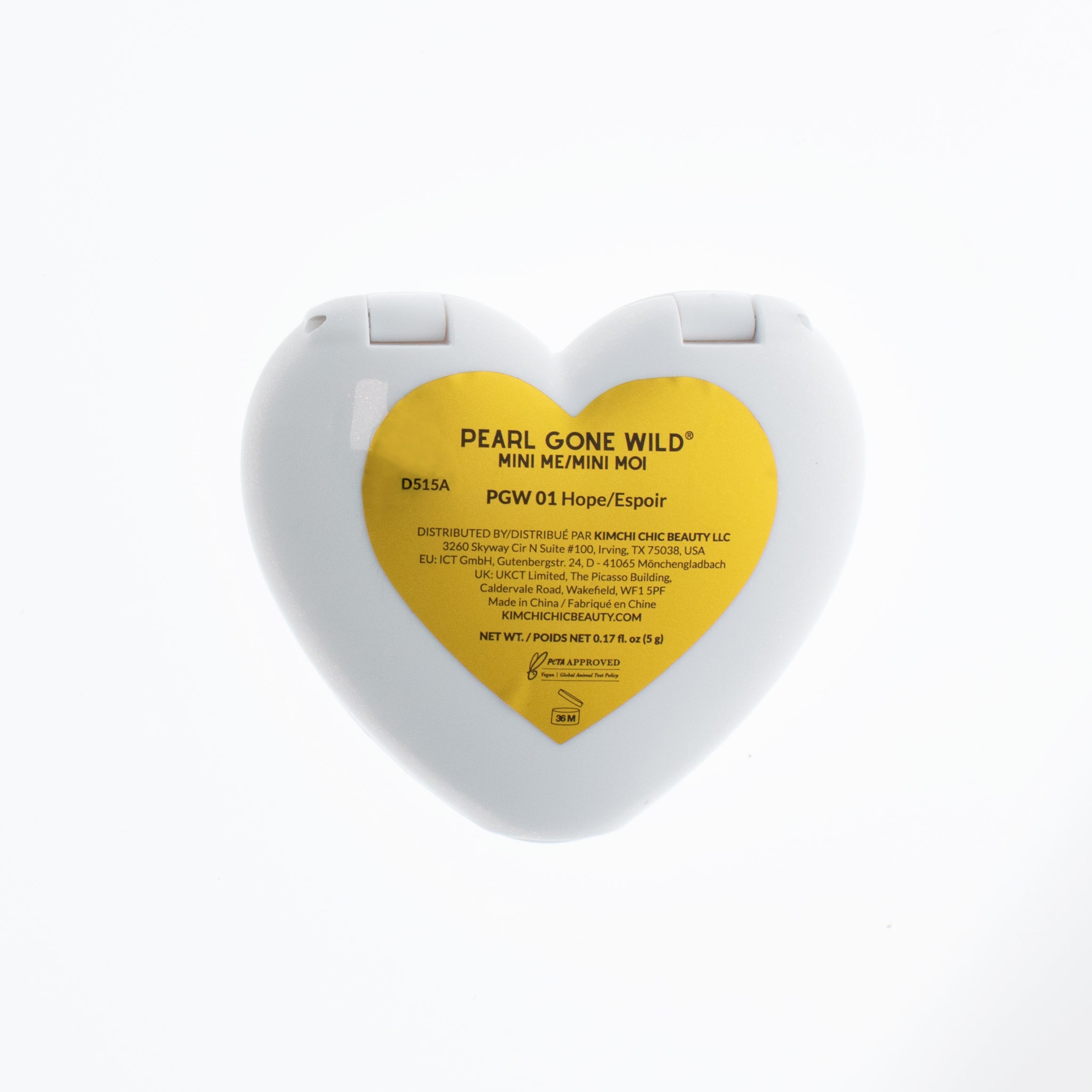 Heart-shaped compact featuring the label 'Pearl Gone Wild' in yellow.
