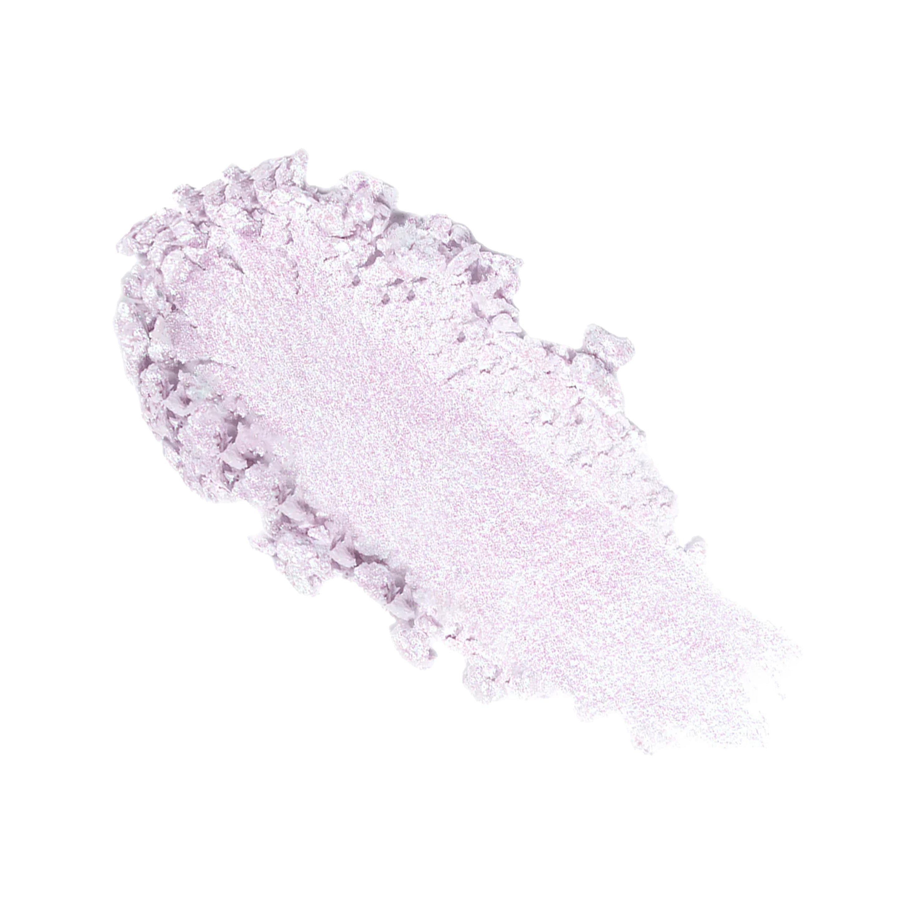 A swatch of light purple cosmetic product with a textured edge.