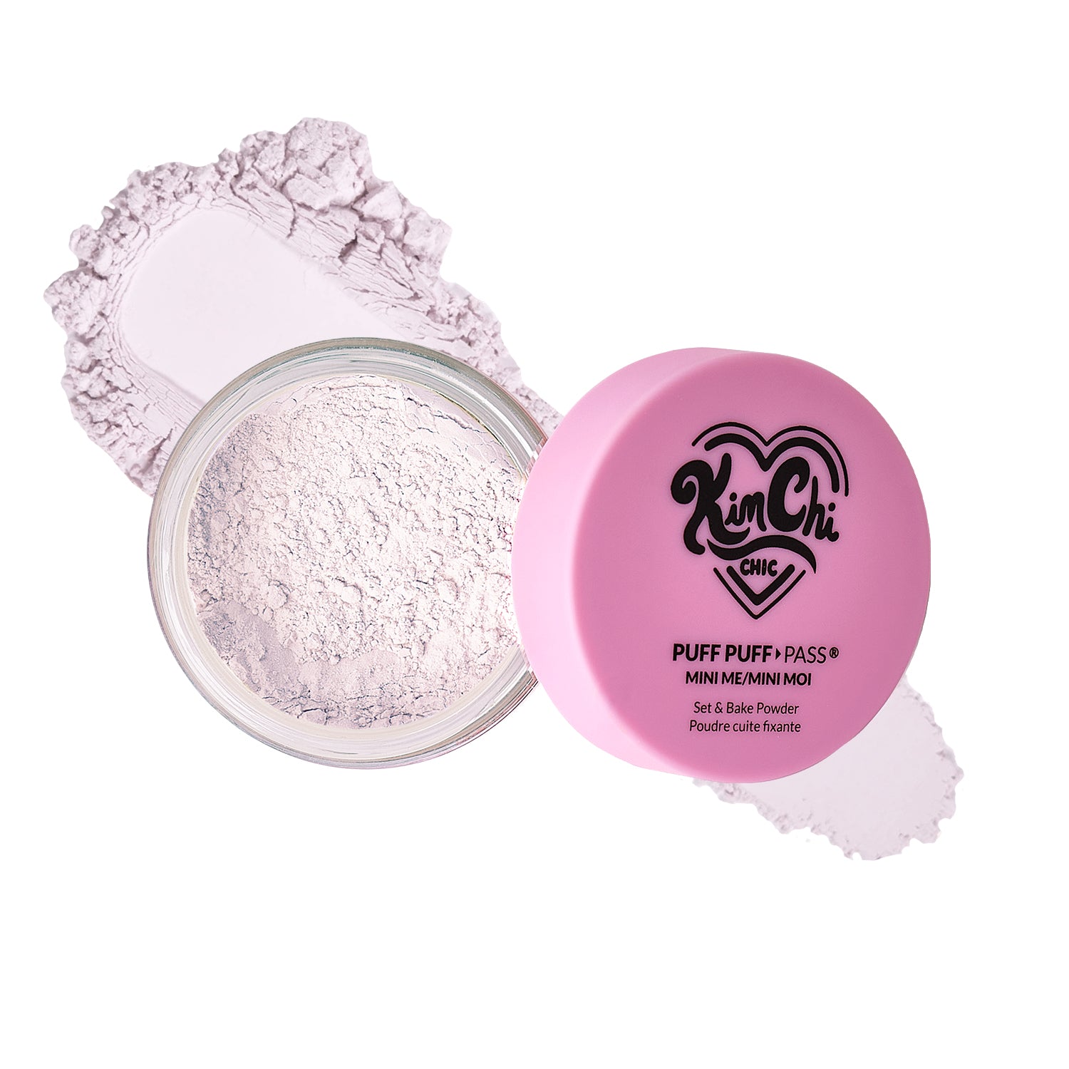 Open jar of Kim Chi Puff Puff Pass translucent setting powder with a dusting of powder nearby.