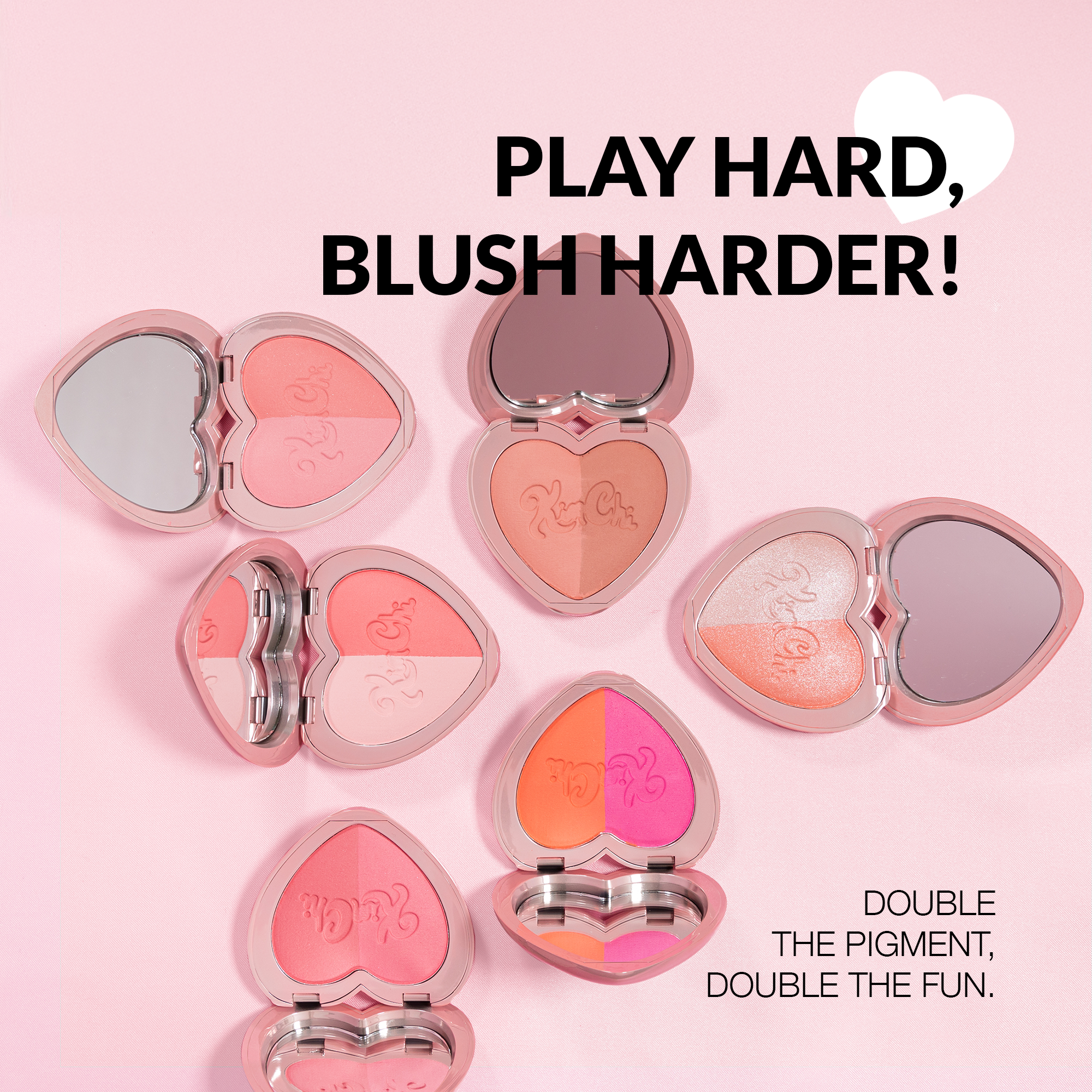 Heart-shaped blush compacts in shades of pink and coral, featuring double pigment for vibrant color.