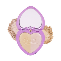 Heart-shaped highlighter palette with two shades: soft gold and champagne, in a lavender case.