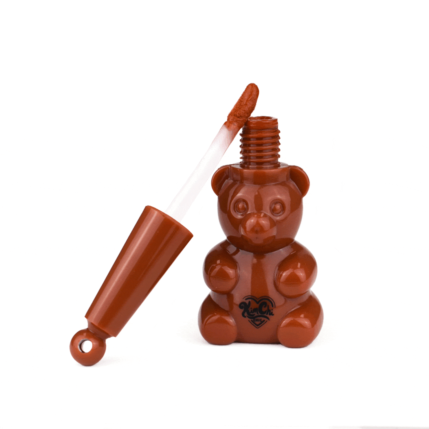 Brown bear-shaped lip gloss with a brush applicator