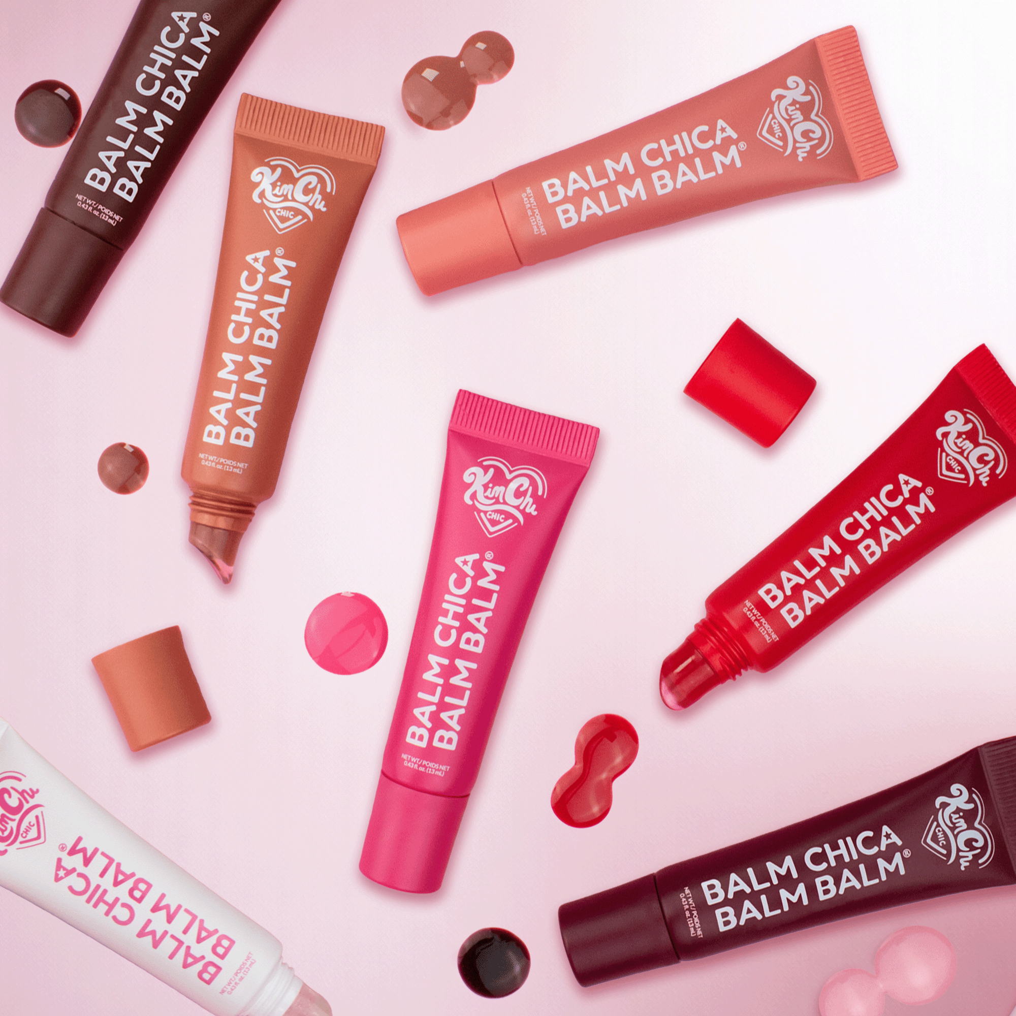 Colorful Balm Chica Balm Balm lip balms in various shades and sizes, featuring sleek tubes and vibrant packaging.