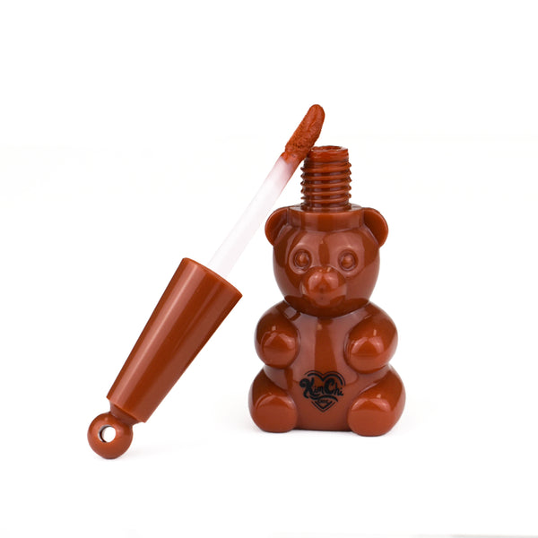 Brown bear-shaped lip gloss with open applicator