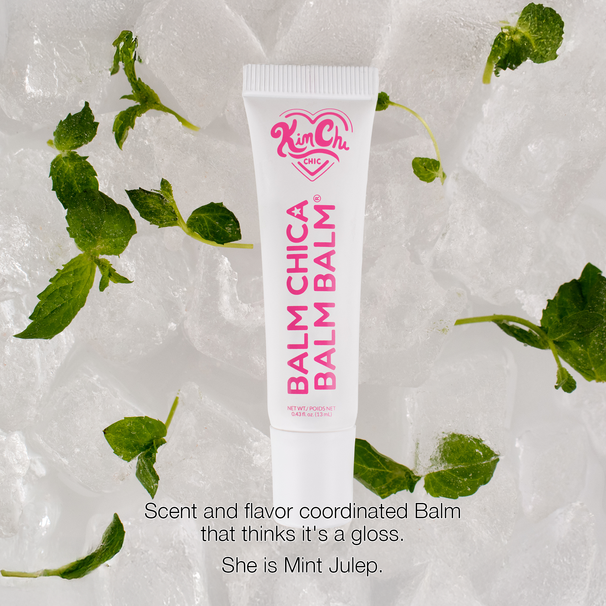 Mint Julep Balm Chica Balm in a white tube, moisturizing with a glossy finish, set on ice and mint leaves.