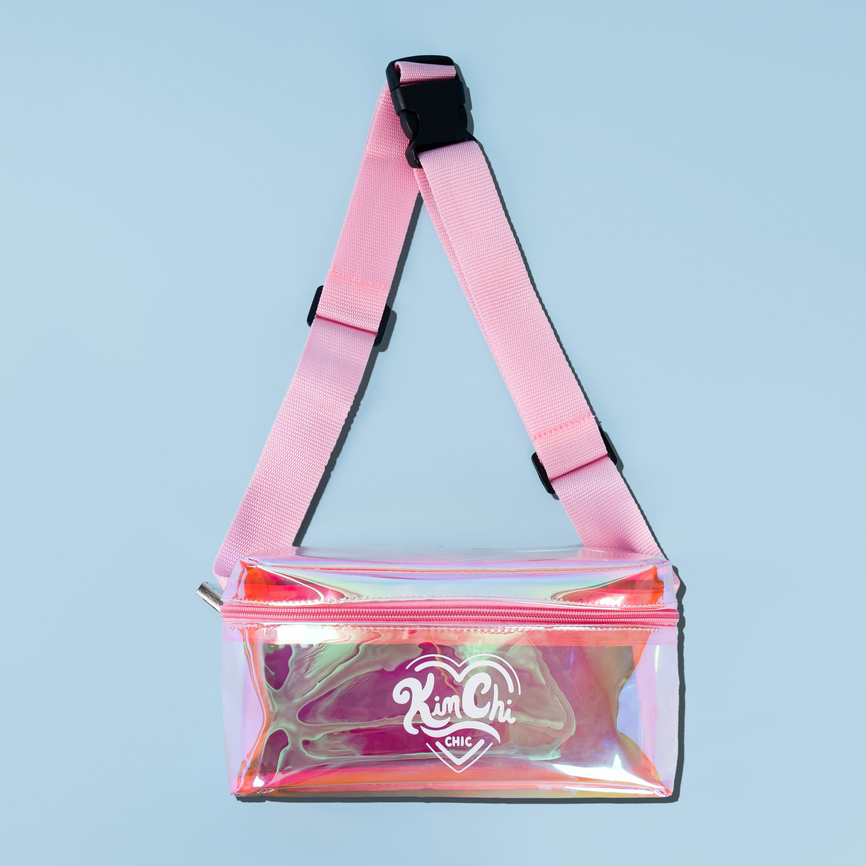 Iridescent crossbody bag with logo on a pink strap