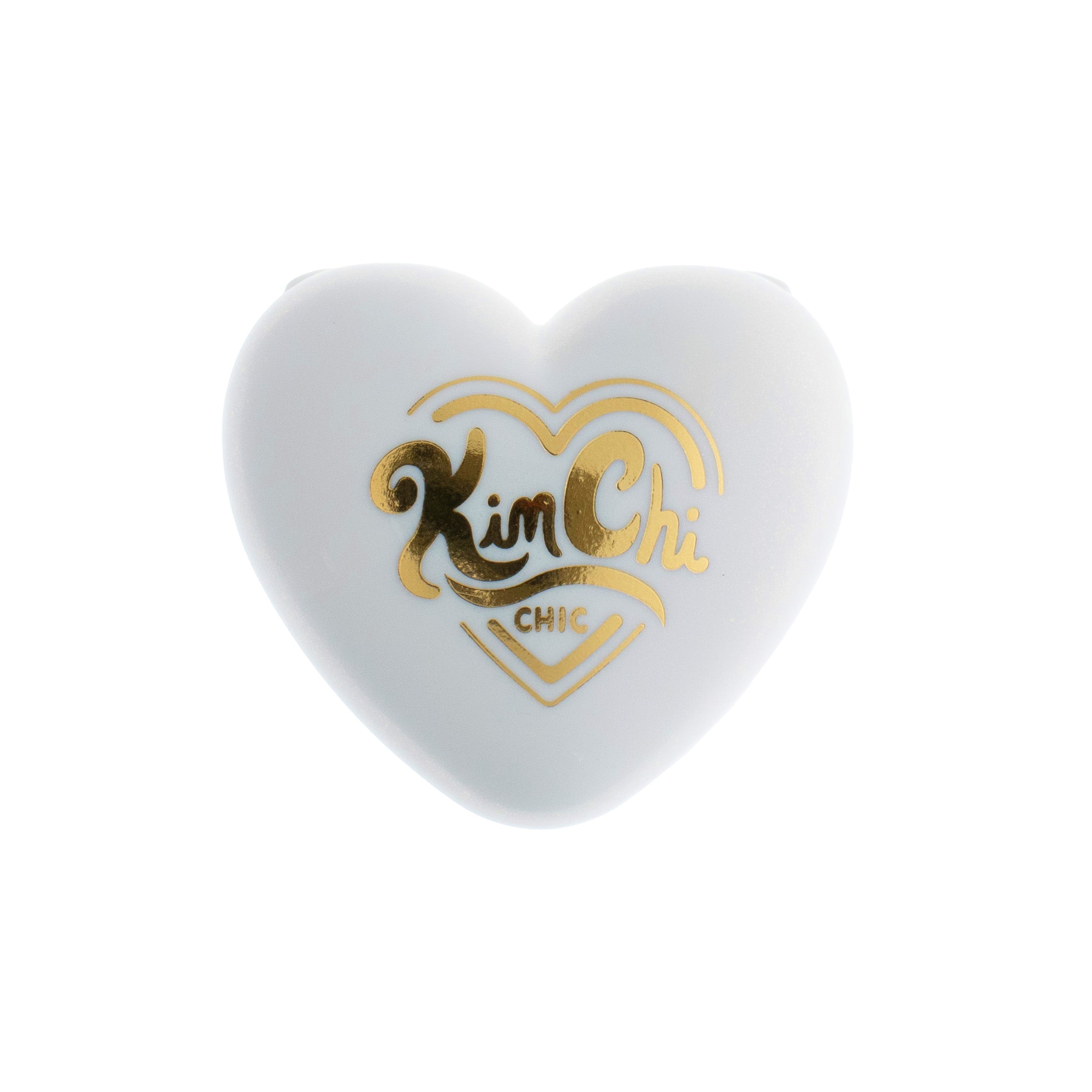 White heart-shaped compact with gold lettering 'Kim Chi Chic'