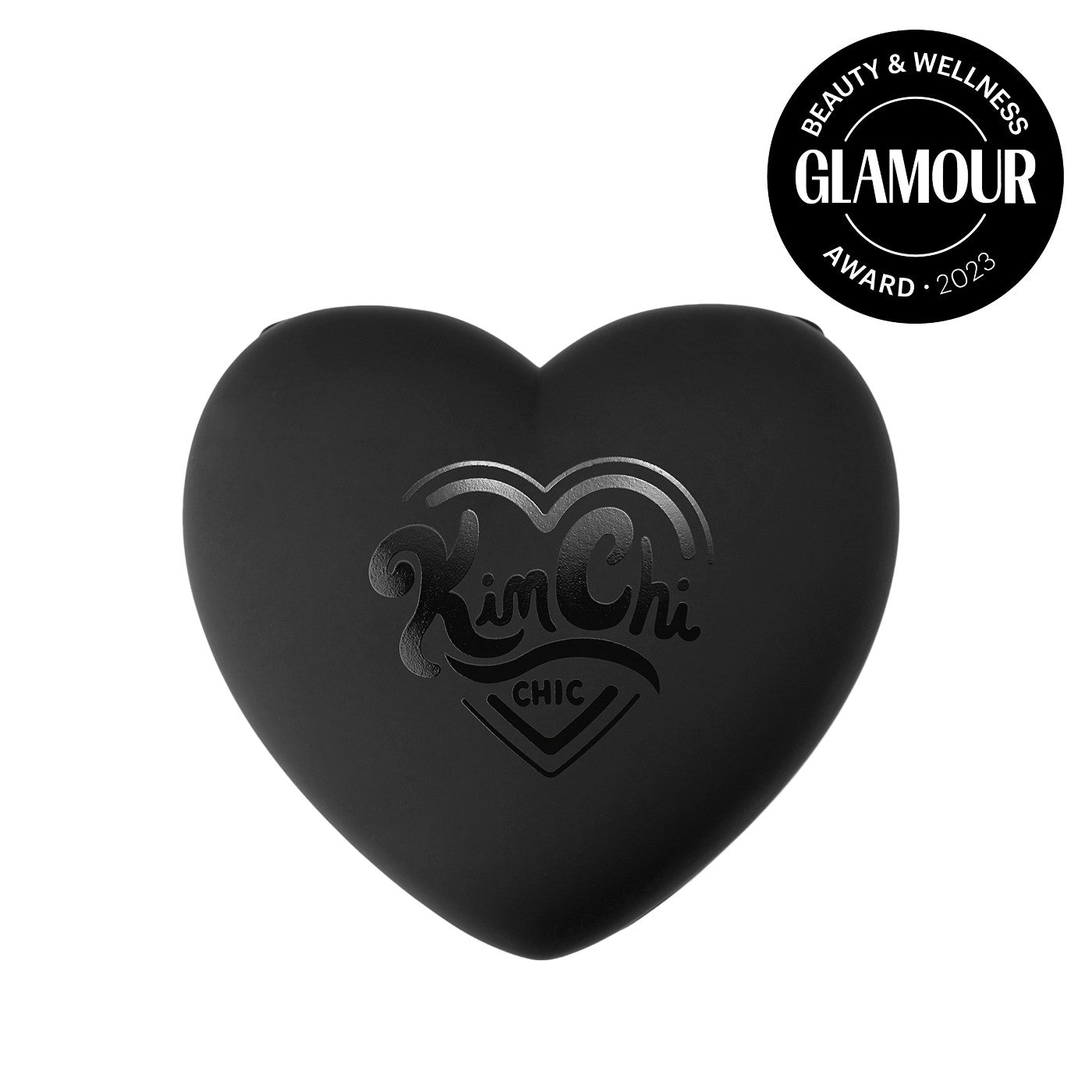 Heart-shaped Kim Chi Chic makeup product with Glamour Beauty and Wellness Award 2023 badge.