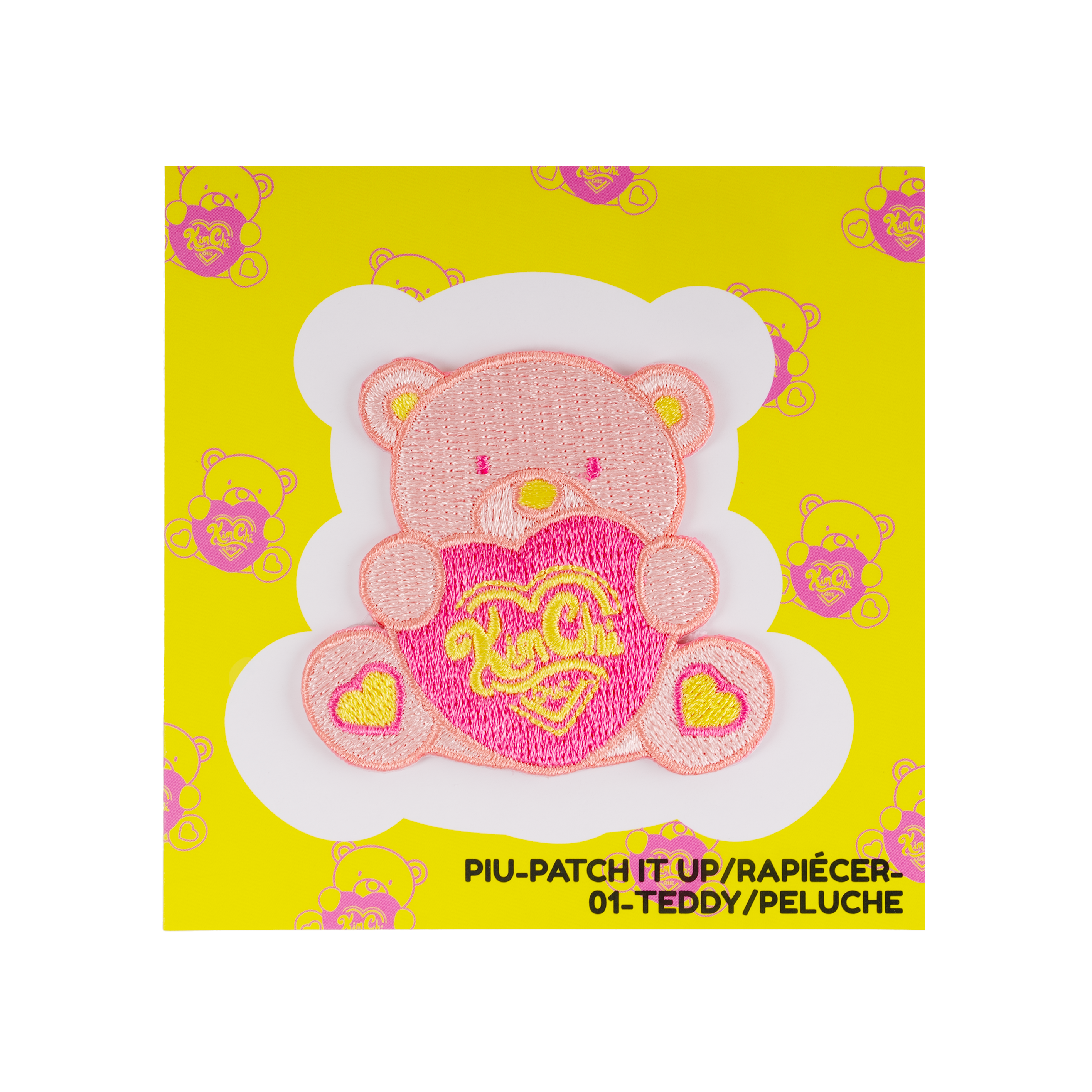 Patch featuring pink teddy bear holding a heart on yellow background with teddy bear pattern.