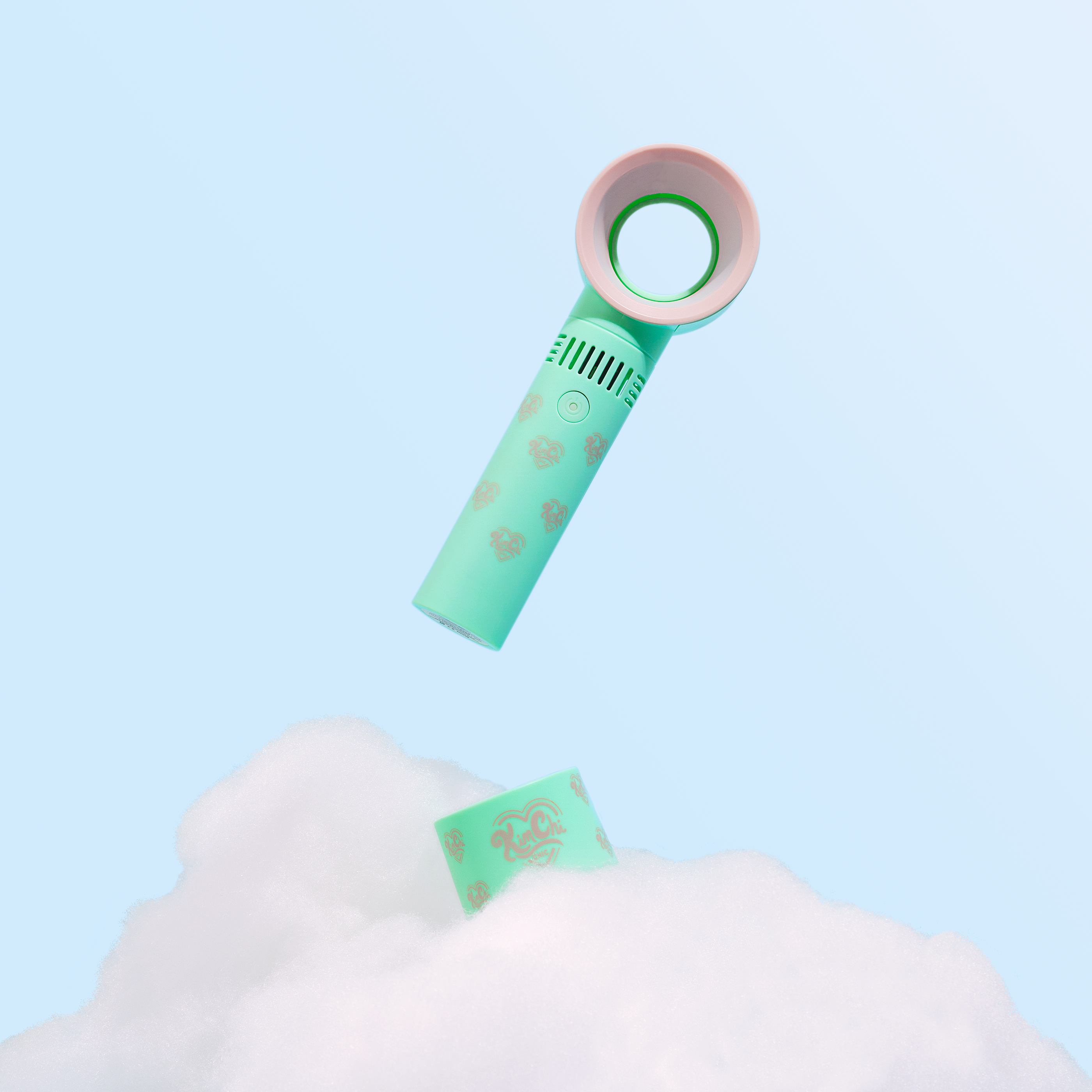 Mint green bladeless fan floating above fluffy clouds.