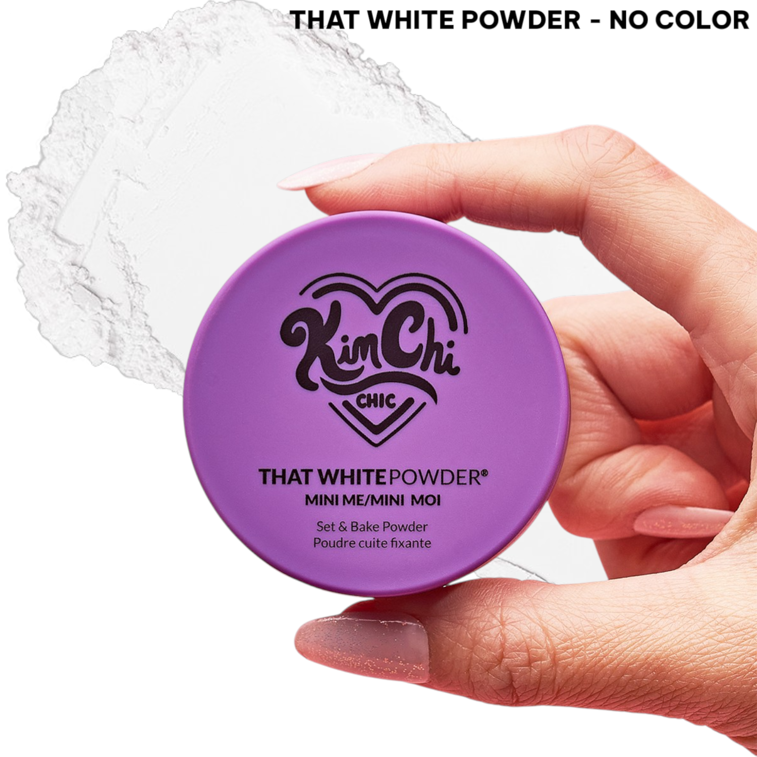 Hand holding a purple container of Kim Chi's That White Powder set and bake powder.