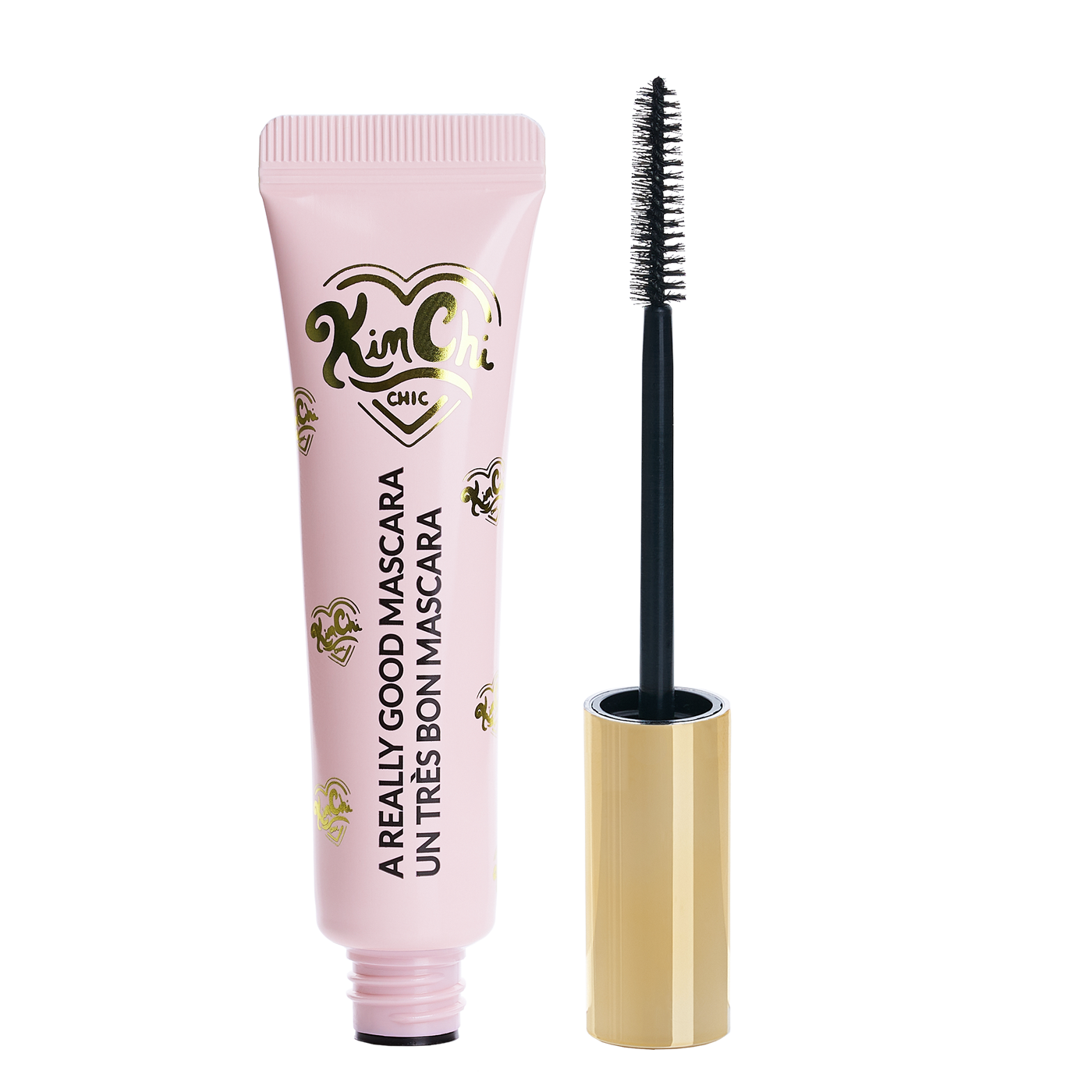 Tube of mascara beside a mascara wand