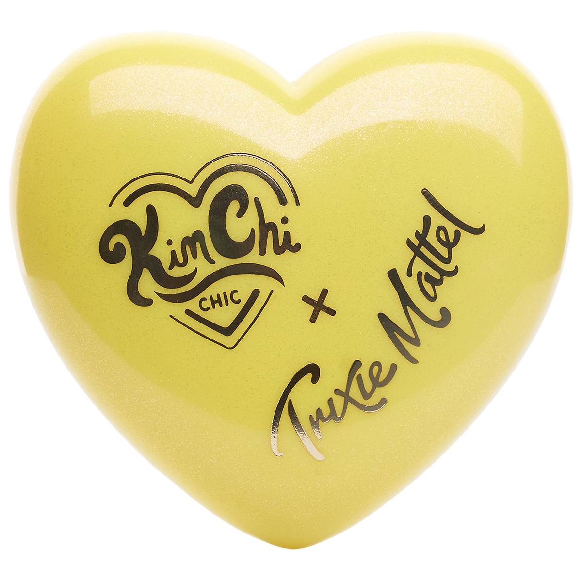 Heart-shaped yellow compact with 'Kim Chi Chic x Trixie Mattel' text.