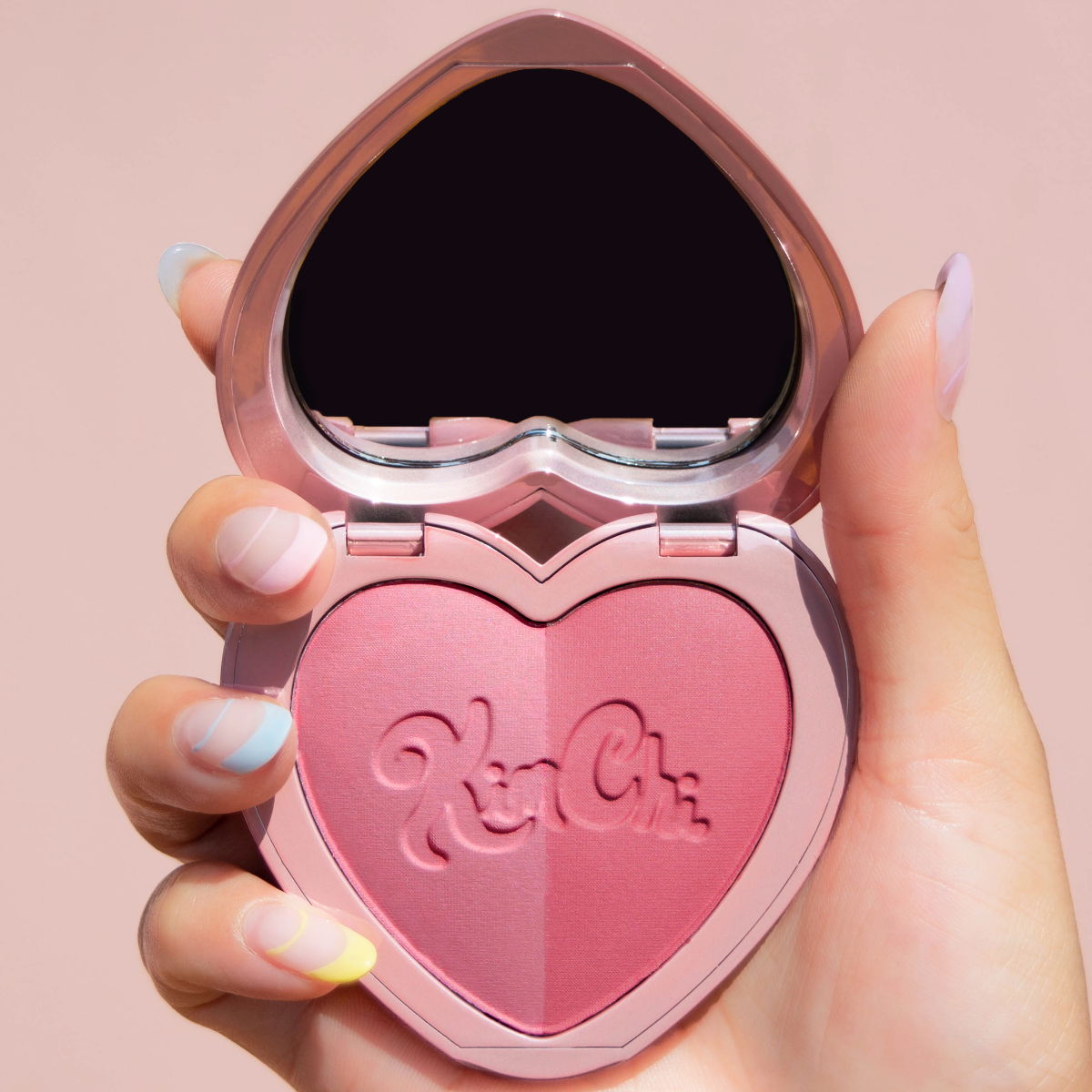 grouped KimChi-Chic-Beauty-Thailor-Collection-Blush-Duo-04-Cheeky heart compact in hand